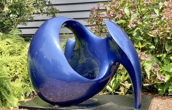 Alt text: dark blue outdoor sculpture