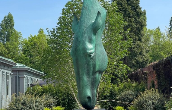 Alt text: Large sculpture of a horse's head