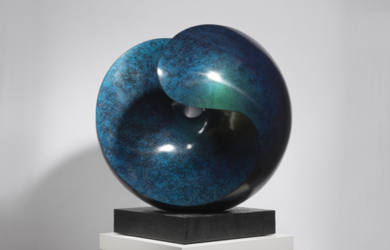 Alt text: Blue spherical bronze sculpture