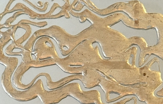 Alt text: Mixed media artwork with gold on mirror