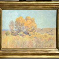Alt text: Oil painting of a yellow landscape, framed