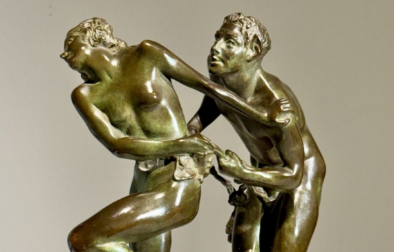 Alt text: Bronze sculpture of two figures holding a grape vine